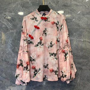 Small stand collar slant breasted top